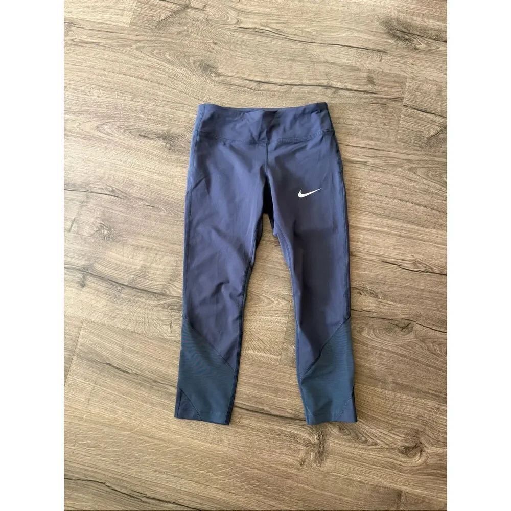 Nike Dri Fit women's mid-rise mesh-panelled cropped tied waist leggings Small